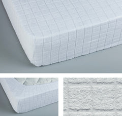 Coprimaterasso 1 posto e mezzo in spugna estensibile